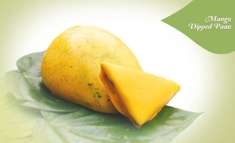 A paan with a golden mango-colored filling.